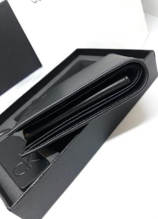 Чоловічий шкіряний гаманець портмоне з брелоком чорний2 фото