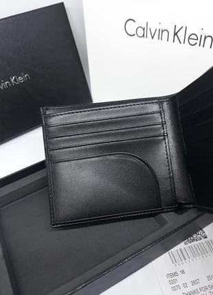 Чоловічий шкіряний гаманець портмоне з брелоком чорний8 фото