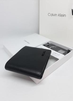 Чоловічий шкіряний гаманець портмоне з брелоком чорний2 фото