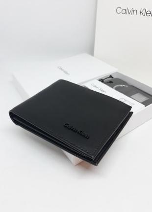 Чоловічий шкіряний гаманець портмоне з брелоком чорний3 фото