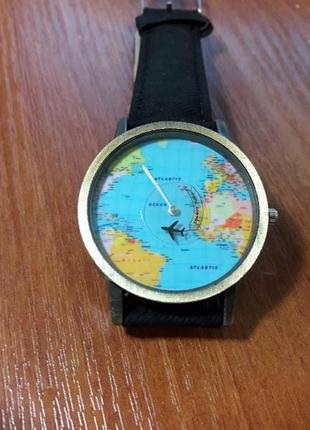 Наручний годинник з картою світу і літаючим літаком 4см міцний...4 фото
