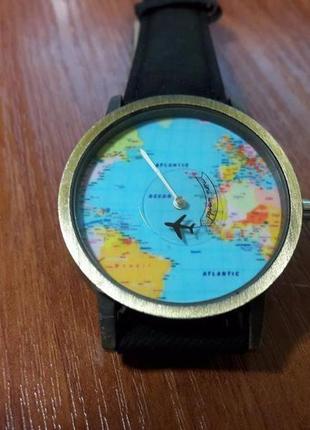 Наручний годинник з картою світу і літаючим літаком 4см міцний...5 фото