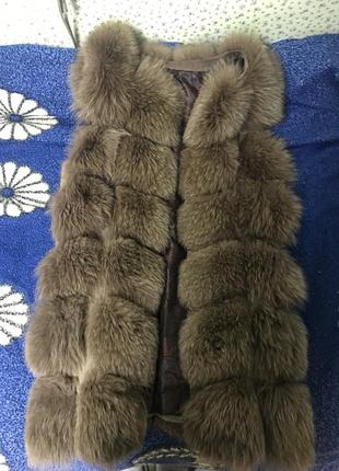 Меховая жилетка