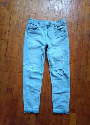 Джинсы с рваностями 4