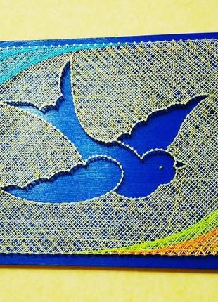 Картина в стилі string-art "синій птах"