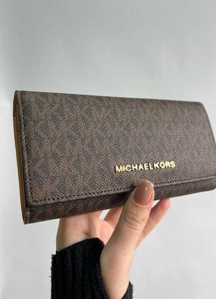 Гаманець michael kors jet set travel wallet brown logo