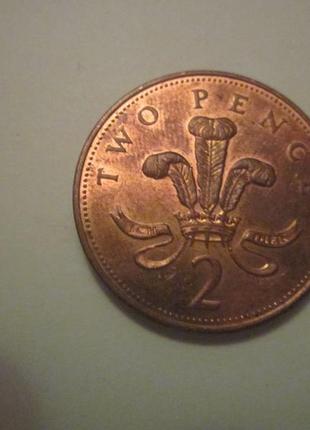 Монети 1 і 2 пені великобританії2 фото