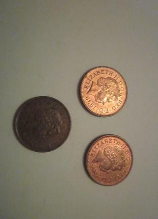 Монети 1 і 2 пені великобританії3 фото