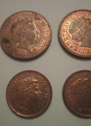 Монети 1 і 2 пені великобританії5 фото