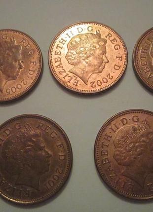 Монети 1 і 2 пені великобританії6 фото