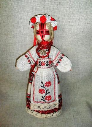 Лялька-мотанка берегиня с вышивкой на одежде1 фото