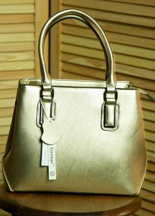 Сумка золотистого кольору