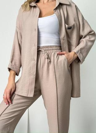 Женский качественный бежевый летний брючный костюм рубашка и брюки лен-жатка4 фото