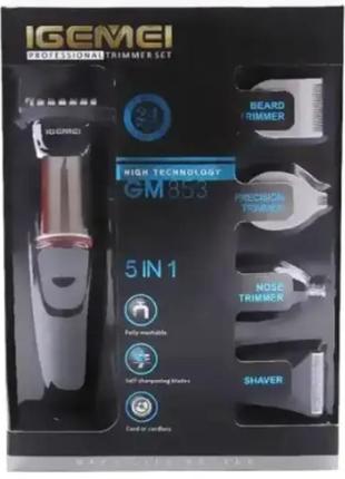 Машинка для стриження волосся на акумуляторі 5 насадок gemei g...6 фото