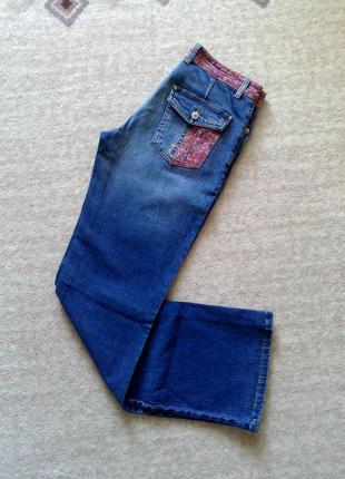 36-38р. джинсы  с цветочными вставками и стразами1 фото