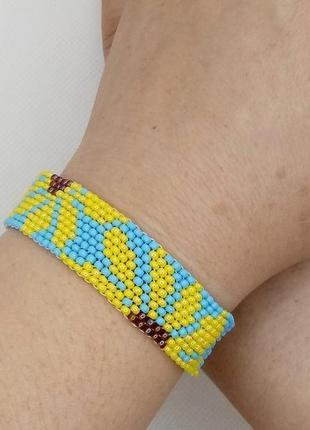 Жовто-блакитний браслет з бісеру - соняшники8 фото
