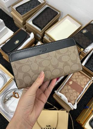 Женский кошелек coach accordion wallet in signature canvas beige7 фото