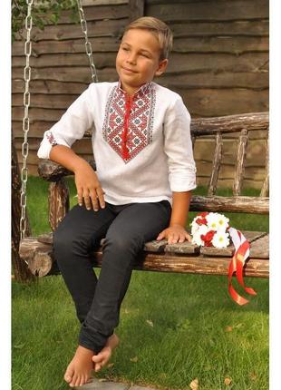 Яркий нарядный комплект для детей в украинском стиле - вышиванка для мальчика и платье для девочки3 фото