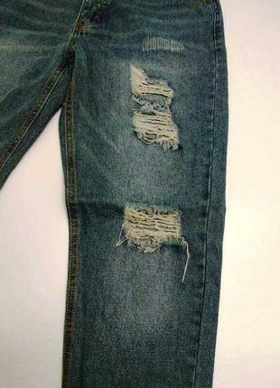 Стильные рваные джинсы с потертостями размера 32r5 фото