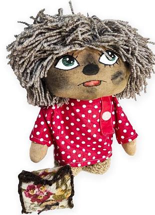 Домовенок кузя из одноименного мультфильма.