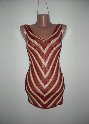 Кофточка смугаста в'язана гачком.