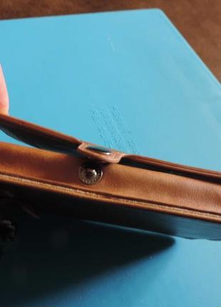Невелика шкіряна дуже гарна сумка для телефона та карток.7 фото