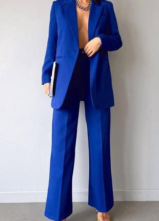 Жіночий строгий класичний костюм із піджаком і штанами5 фото