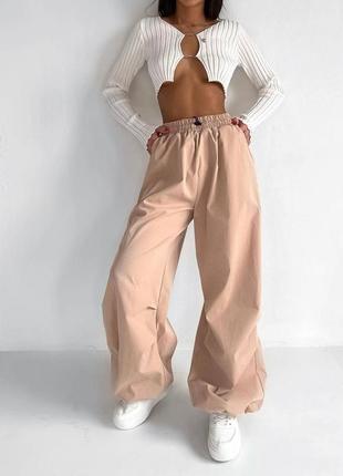 Жіночі широкі штани з плащової тканини із затяжками розмір: 42-469 фото