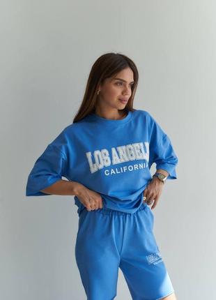 Трендовый костюм футболка оверсайз с надписью лос анджелес калифорния принтом шорты с высокой посадкой на резинке7 фото
