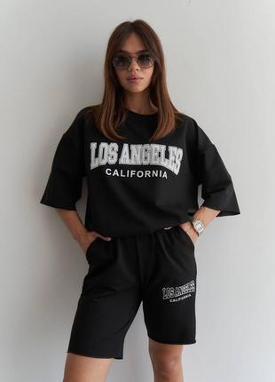 Трендовый костюм футболка оверсайз с надписью лос анджелес калифорния принтом шорты с высокой посадкой на резинке8 фото