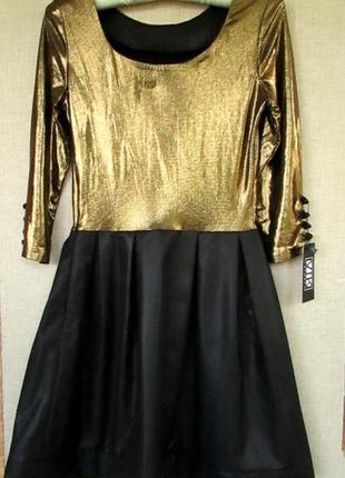 Красиве блискуче ошатне плаття чорно-золоте