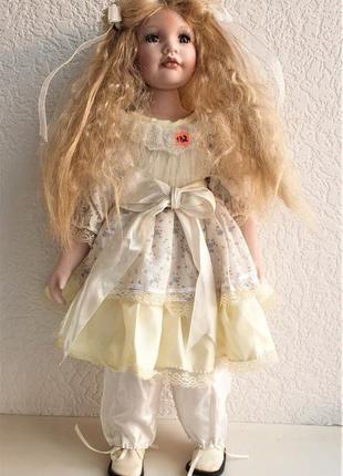Фарфоровые коллекционные куклы1 фото