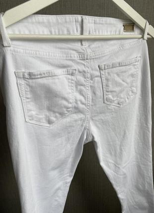Білі жіночі джинси5 фото