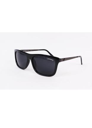 Б/у солнцезащитные очки с металлическими дужками черные lacoste1 фото