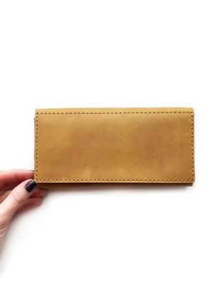 Шкіряний жіночий гаманець жовтого кольору5 фото