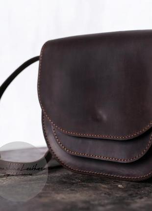 Жіноча кругла сумка solo через плече з натуральної шкіри4 фото