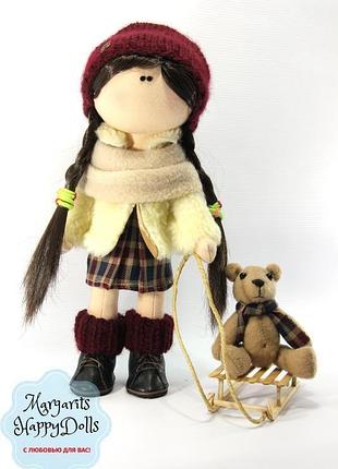 Интерьерная текстильная куколка брюнетка с мишкой на санках