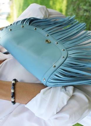 Кожаная женская поясная сумка с бахромой5 фото