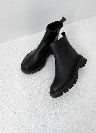 Зимові черевики шкіряні у чорному кольорі9 фото