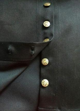 Жіноча джинсова спідниця-трапеція на гудзиках чорна 48 розмір4 фото