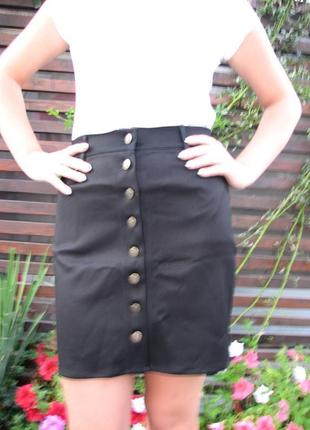 Жіноча джинсова спідниця-трапеція на гудзиках чорна 48 розмір6 фото