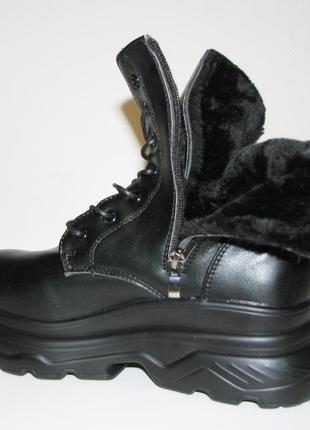 Чорні високі зимові черевики на тракторній підошві товста по...6 фото