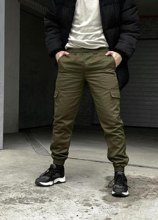 Чоловічі теплі брюки карго штани на флісі з кишенями хакі3 фото