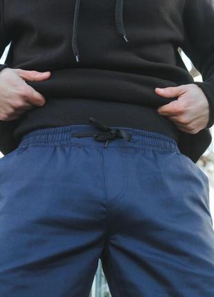Чоловічі штани карго intruder штани карго з кишенями на манжет...8 фото