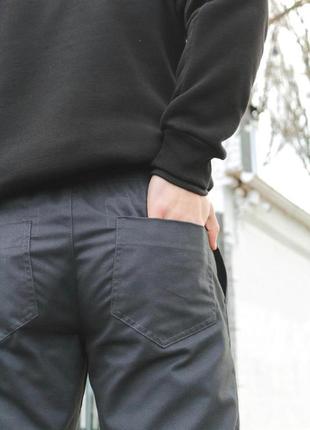 Чоловічі штани карго intruder штани карго з кишенями на манжет...9 фото