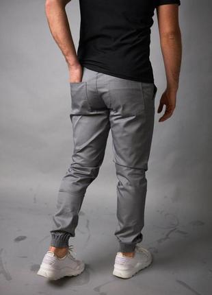 Чоловічі штани карго intruder штани карго з кишенями на манжет...6 фото