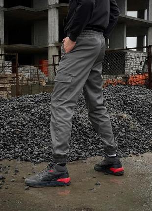 Чоловічі теплі брюки карго штани на флісі з кишенями сірі3 фото