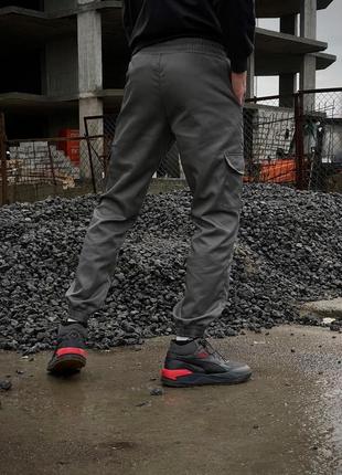 Чоловічі теплі брюки карго штани на флісі з кишенями сірі4 фото