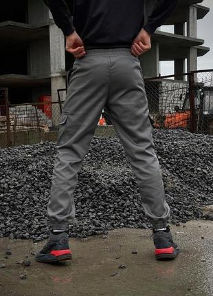 Чоловічі теплі брюки карго штани на флісі з кишенями сірі6 фото
