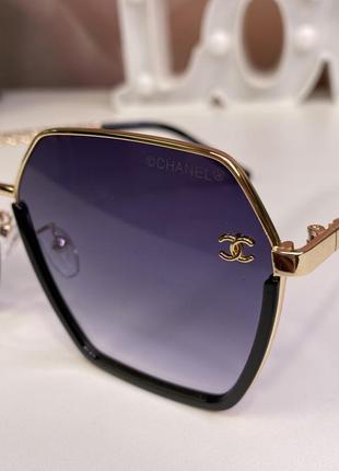 Модні жіночі брендові сонцезахисні окуляри в металевій оправі ...3 фото